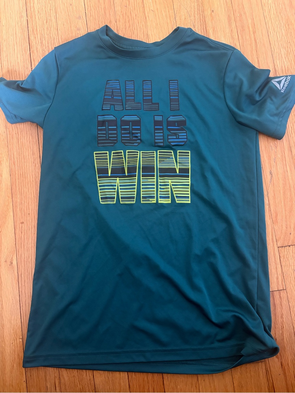 Reebok Teal Short Sleeve Tee with 'ALL I DO IS WIN' Graphic